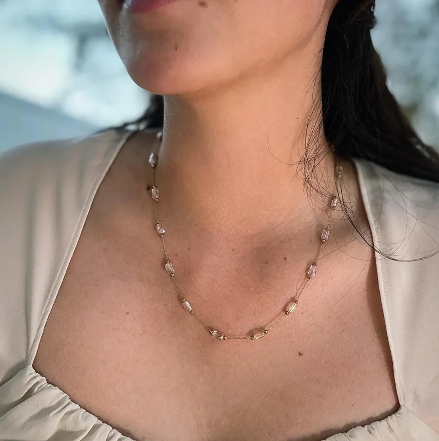 Delicate gold permanent necklace with small crystal beads